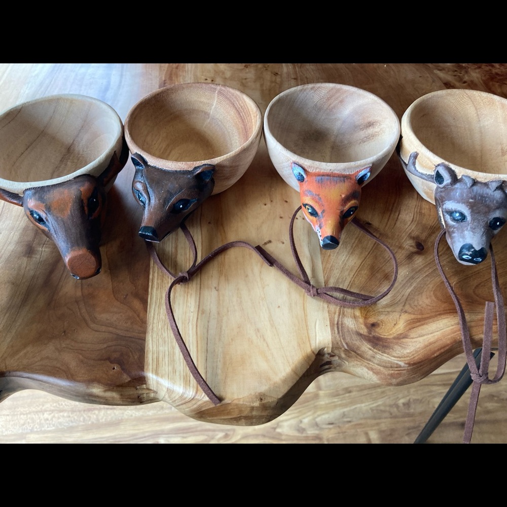 Set of four wooden wild animal mugs